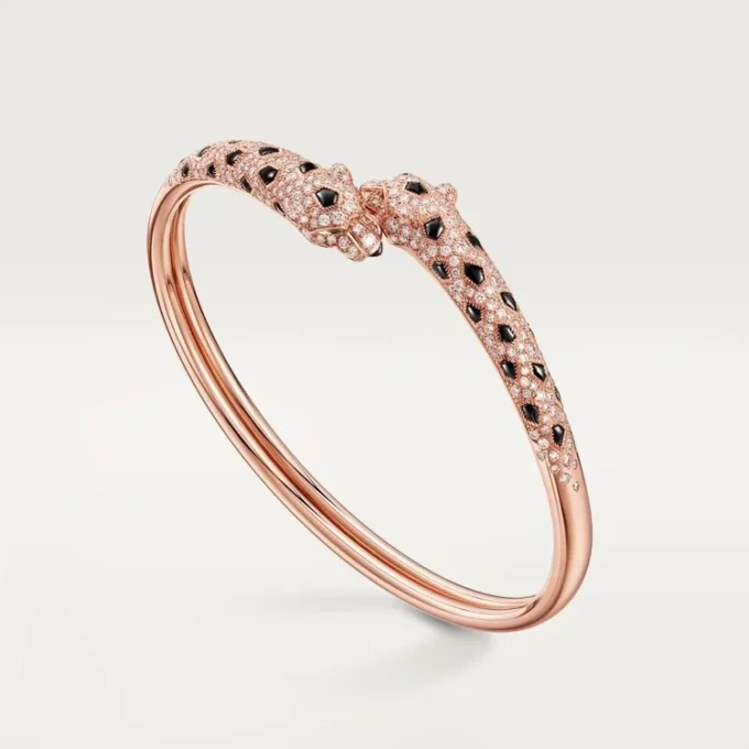 Panthere de Cartier Armband, kleines Modell, halb mit Diamanten besetzt