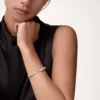 Panthere de Cartier Armband, kleines Modell, halb mit Diamanten besetzt