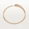Panthere de Cartier Armband, kleines Modell, halb mit Diamanten besetzt