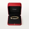 Panthere de Cartier Armband, kleines Modell, halb mit Diamanten besetzt