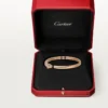Panthere de Cartier Armband, kleines Modell, halb mit Diamanten besetzt