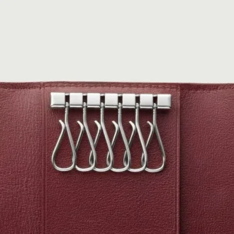 Schlüsselanhänger für 6 Schlüssel, Must de Cartier – Schwarzes Kalbsleder, Edelstahl-Finish – Cartier